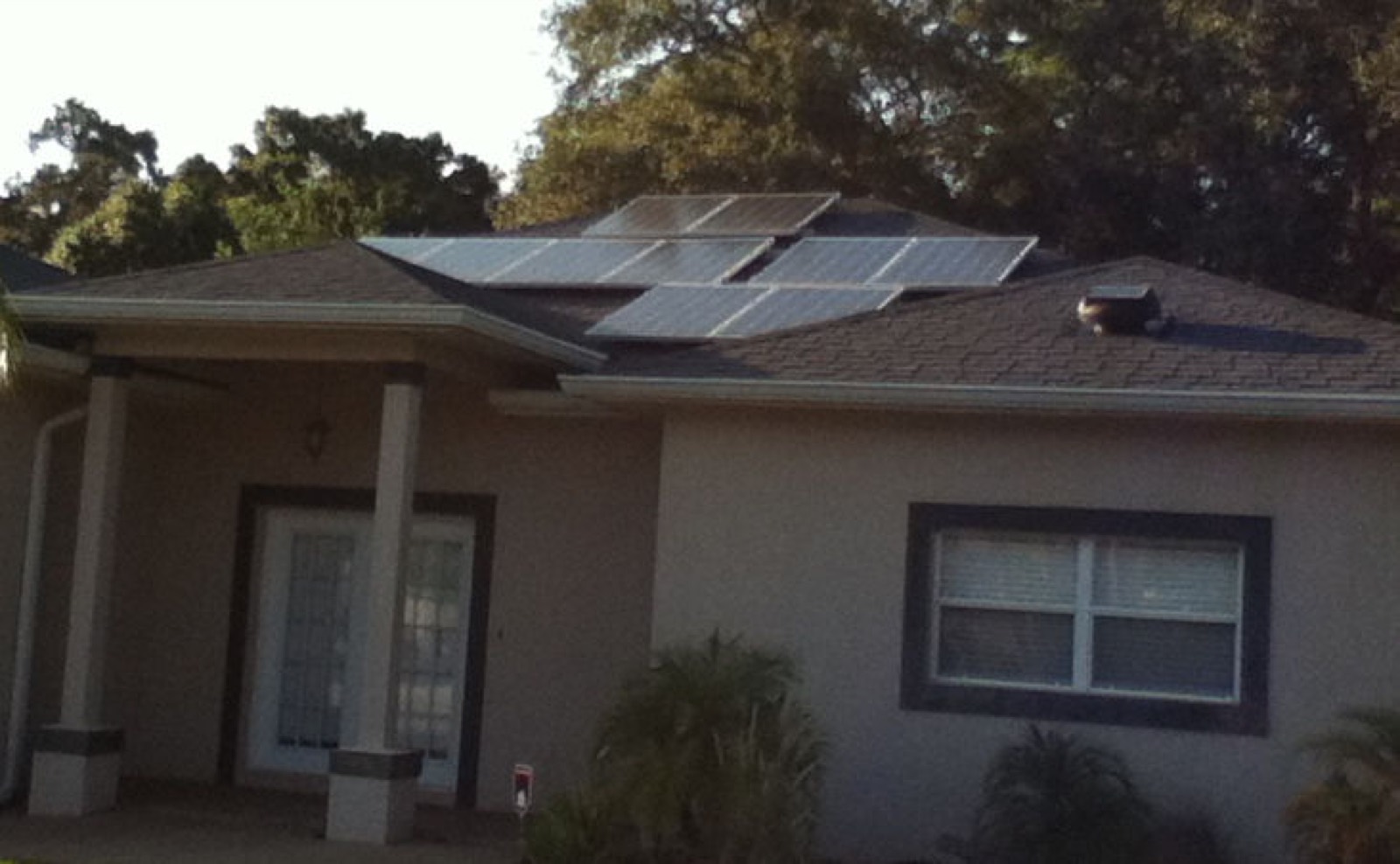 Rooftop solar panels installed on a Florida home near Tampa converting sunshine into electricity